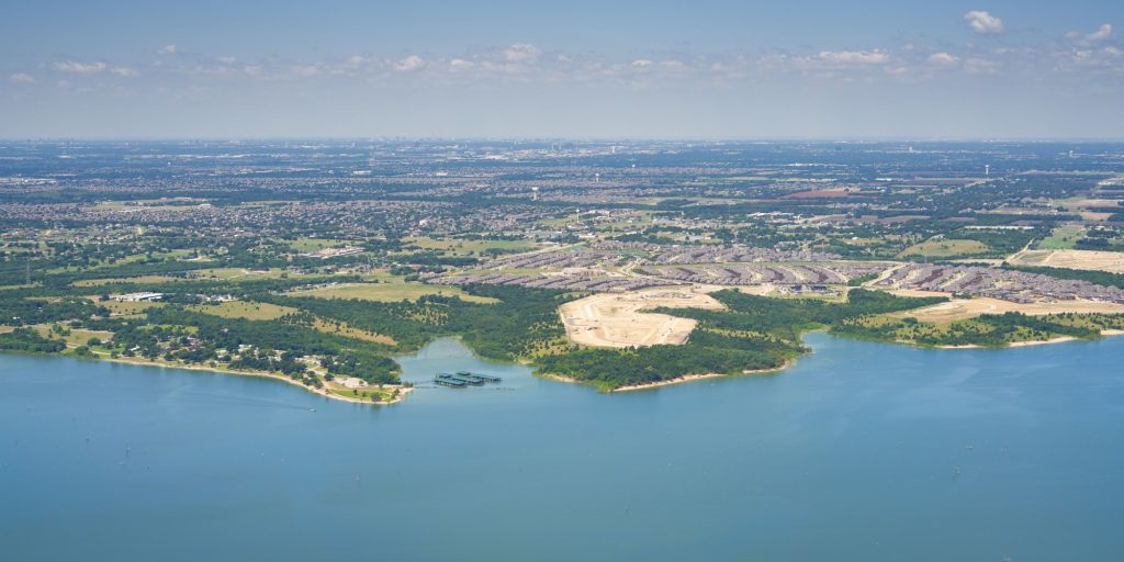 Aerial view of Lavon Lake, Texas, USA. Fresh water reservoir, located in Collin County, part of the Dallas-Fort Worth-Arlington, Texas Metropolitan Area. City of Lucas, suburban residential area.