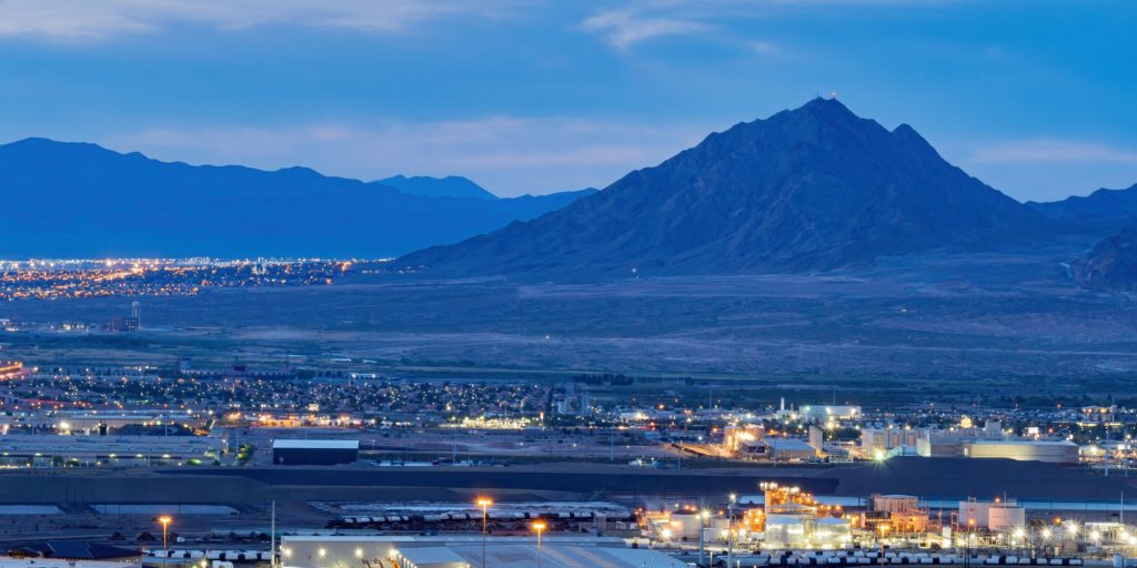 Dusk high angle view of the Frenchman Mountain and cityscape from Henderson View Pass at Nevada