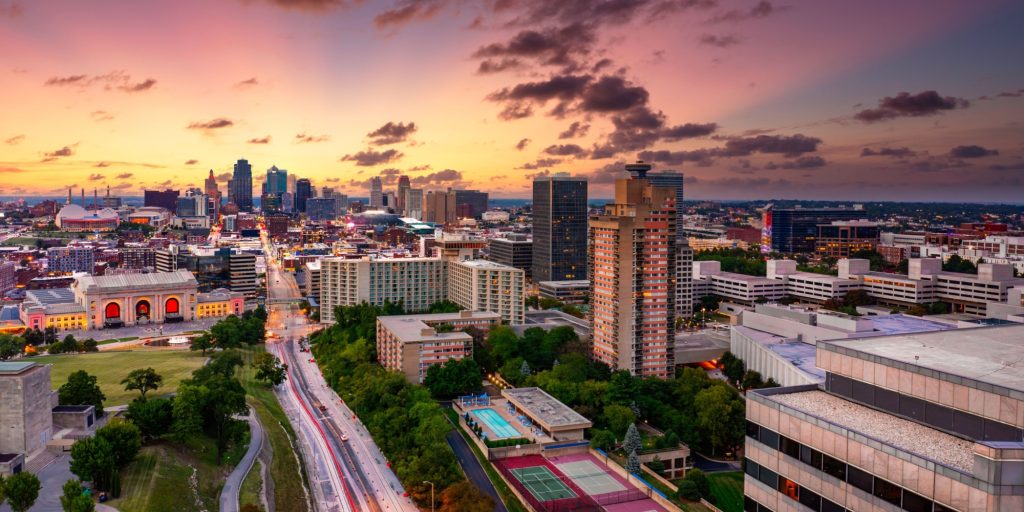 Aerial view of Kansas City skyline at dusk, viewed from Penn Valley Park. Kansas City is the largest city in Missouri.