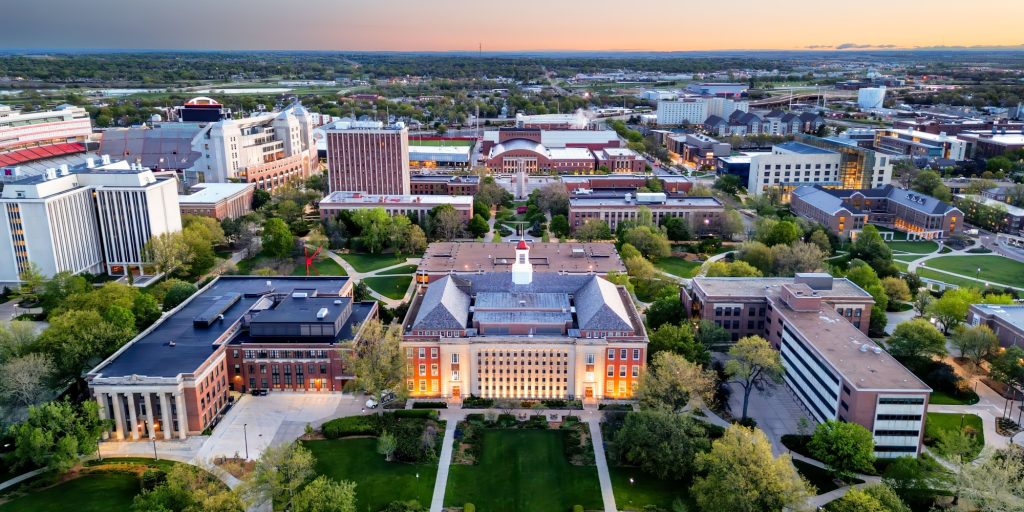 Lincoln, Nebraska, USA cityscape overlooking University of Nebraska at twilight.