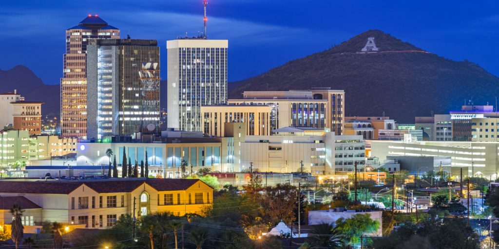 Tucson, Arizona, USA downtown skyline with Sentinel Peak at dusk. (Mountaintop "A" for "Arizona")