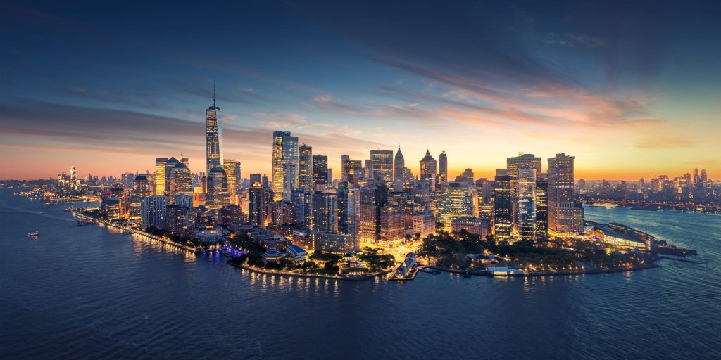 New York City panorama skyline at sunrise. Manhattan office buildings / skysrcapers at the morning. New York City panoramatic shot.