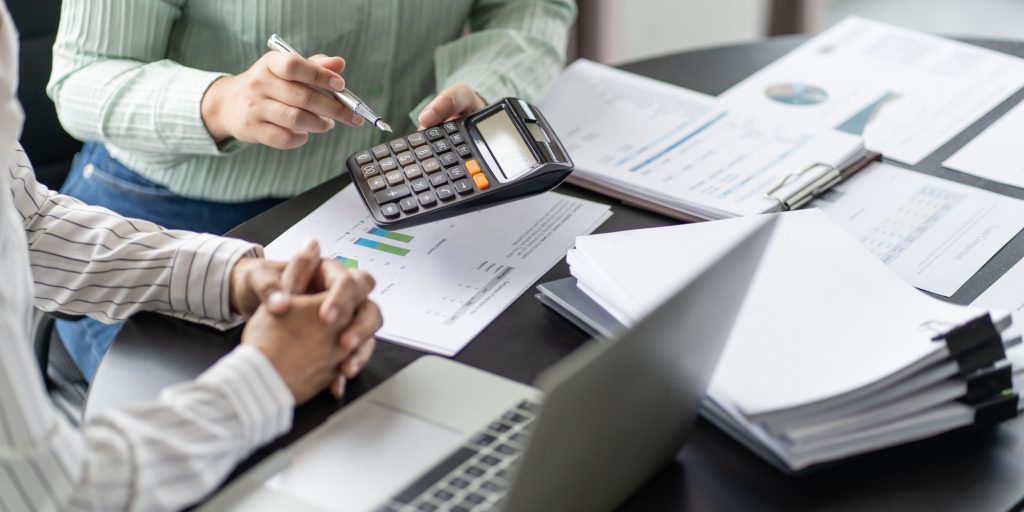 Auditor or internal revenue service staff, Business women checking annual financial statements of company. Audit Concept.